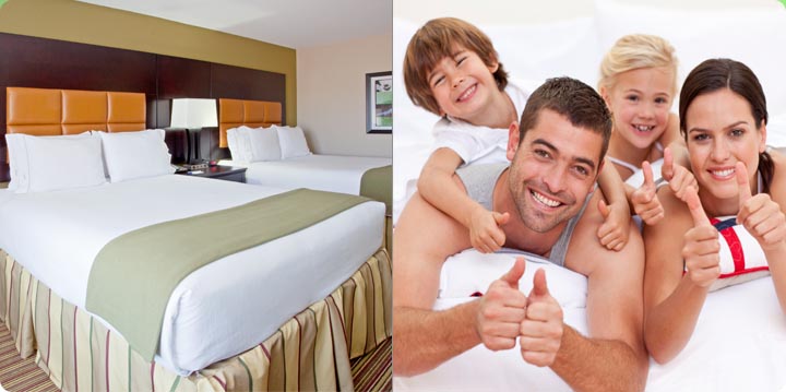 Arlington Texas Hotel Suite with Two Beds Accommodations smiling family in bed
